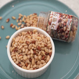 Yellow pine nuts on plate