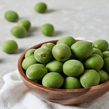 Green plums on plate